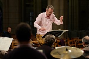Luke Bond conducting St Mary's Singers